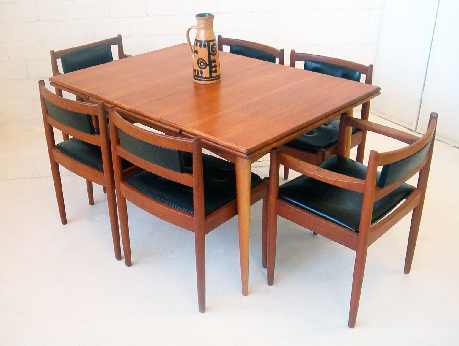 chiswell-dining-chairs-parker-fler-danish-eames-dining-suite-vintage-retro